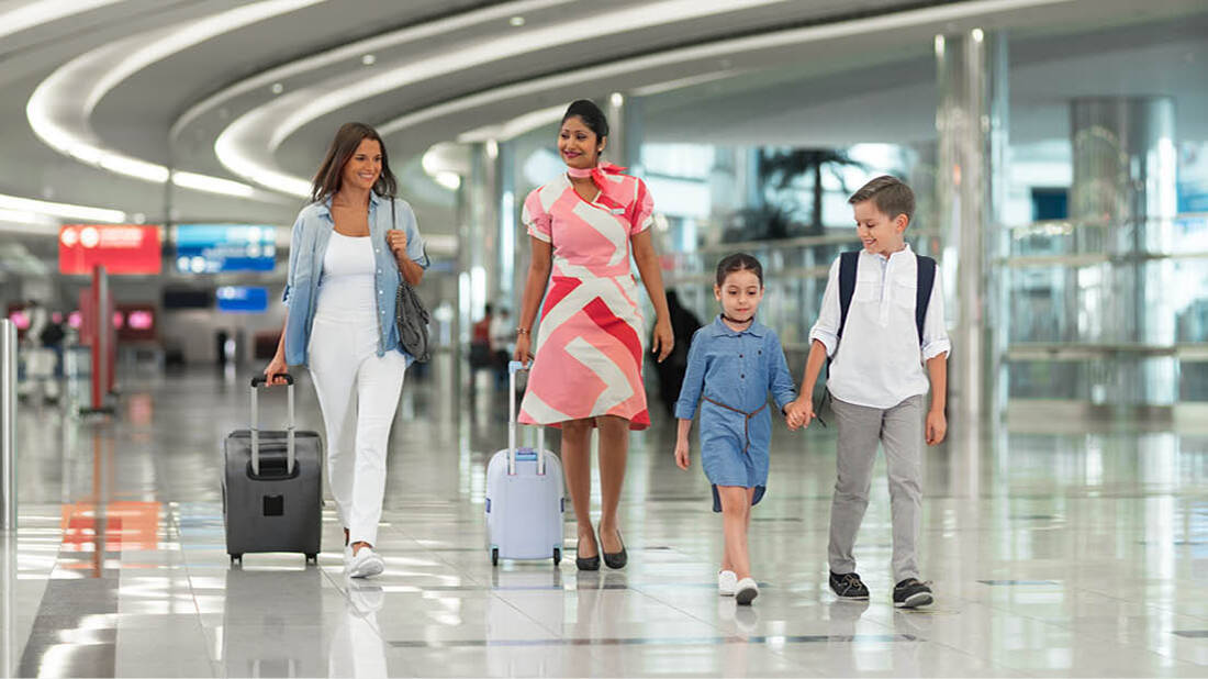 marhaba representative assisting mother and kids