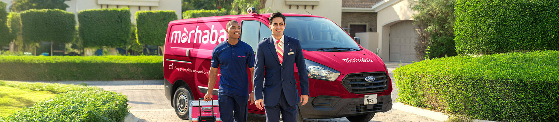 marhaba Check-in Anywhere representative in front of a Dubz van