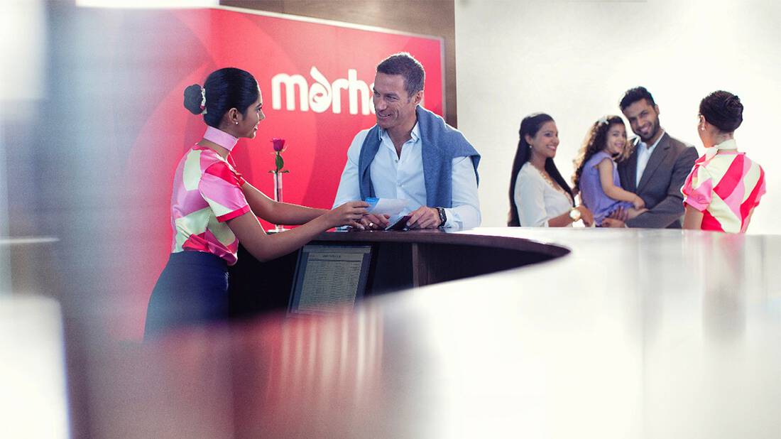 marahba representative assisting passenger at front desk